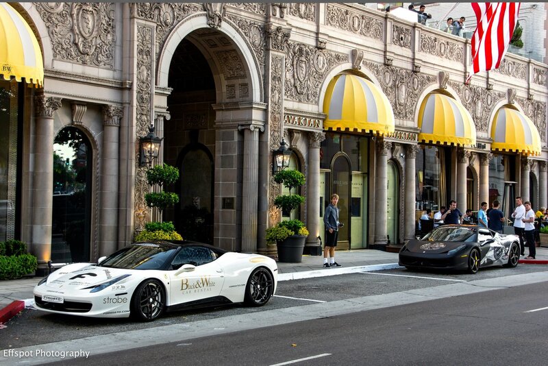 Ferrari cars outside a luxury hotel
