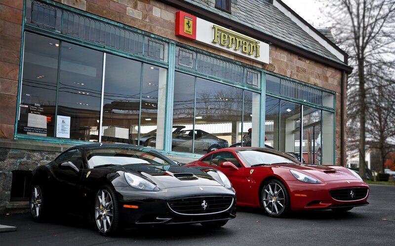 Ferrari cars outside dealership