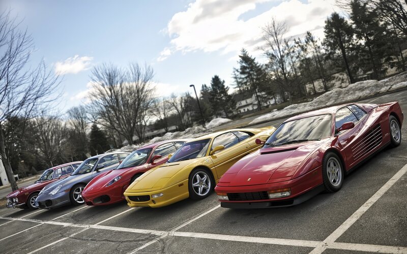 Ferrari collection in parking lot