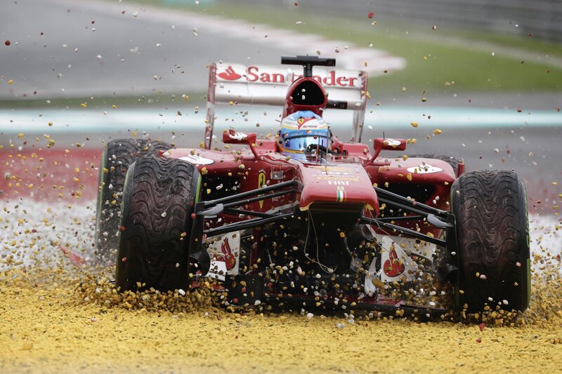 Ferrari crashes on gravel