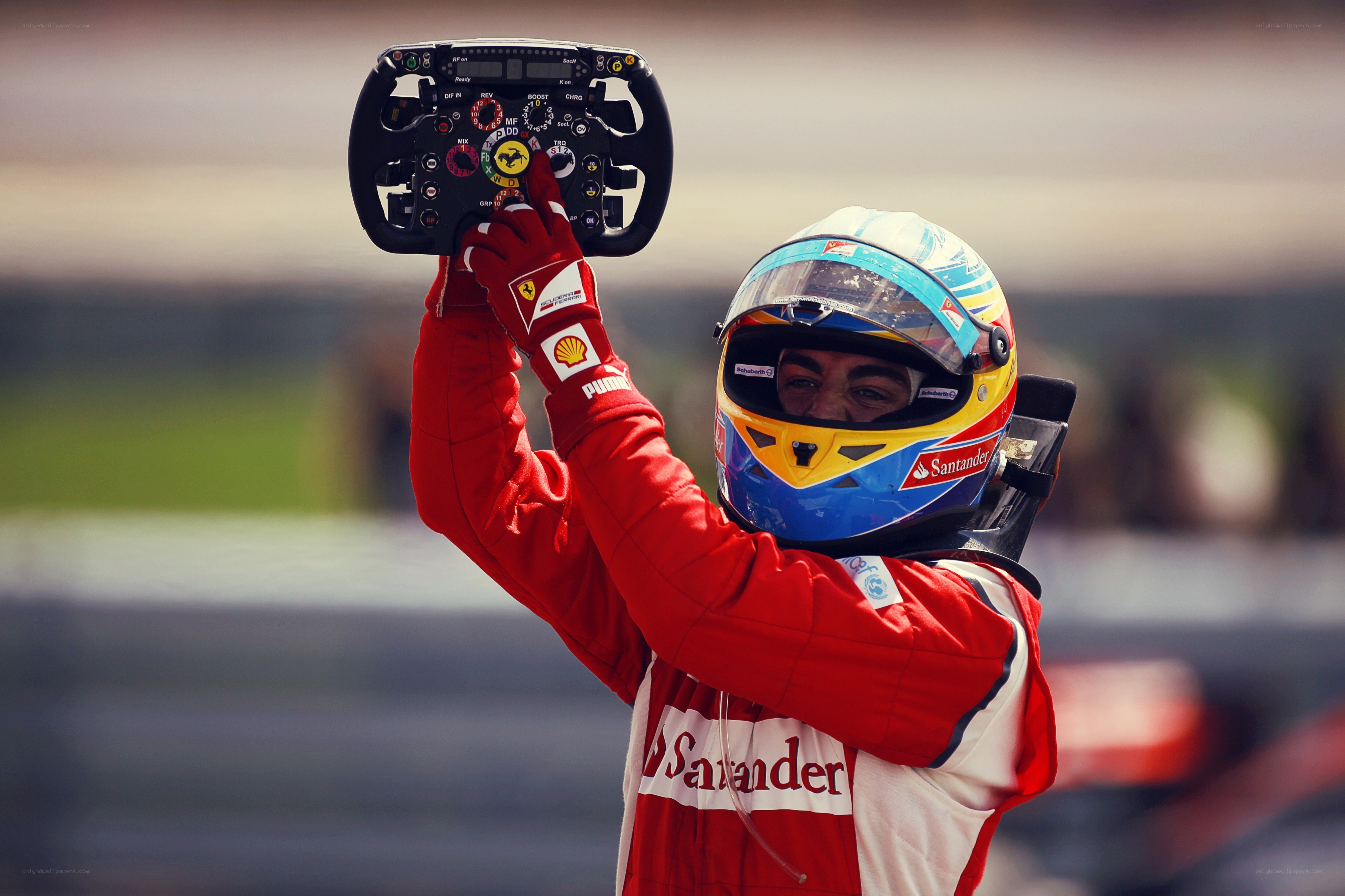 Ferrari driver celebrates with steering wheel