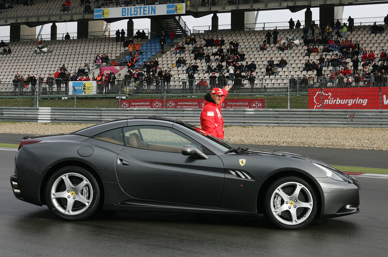 Ferrari driver on racetrack