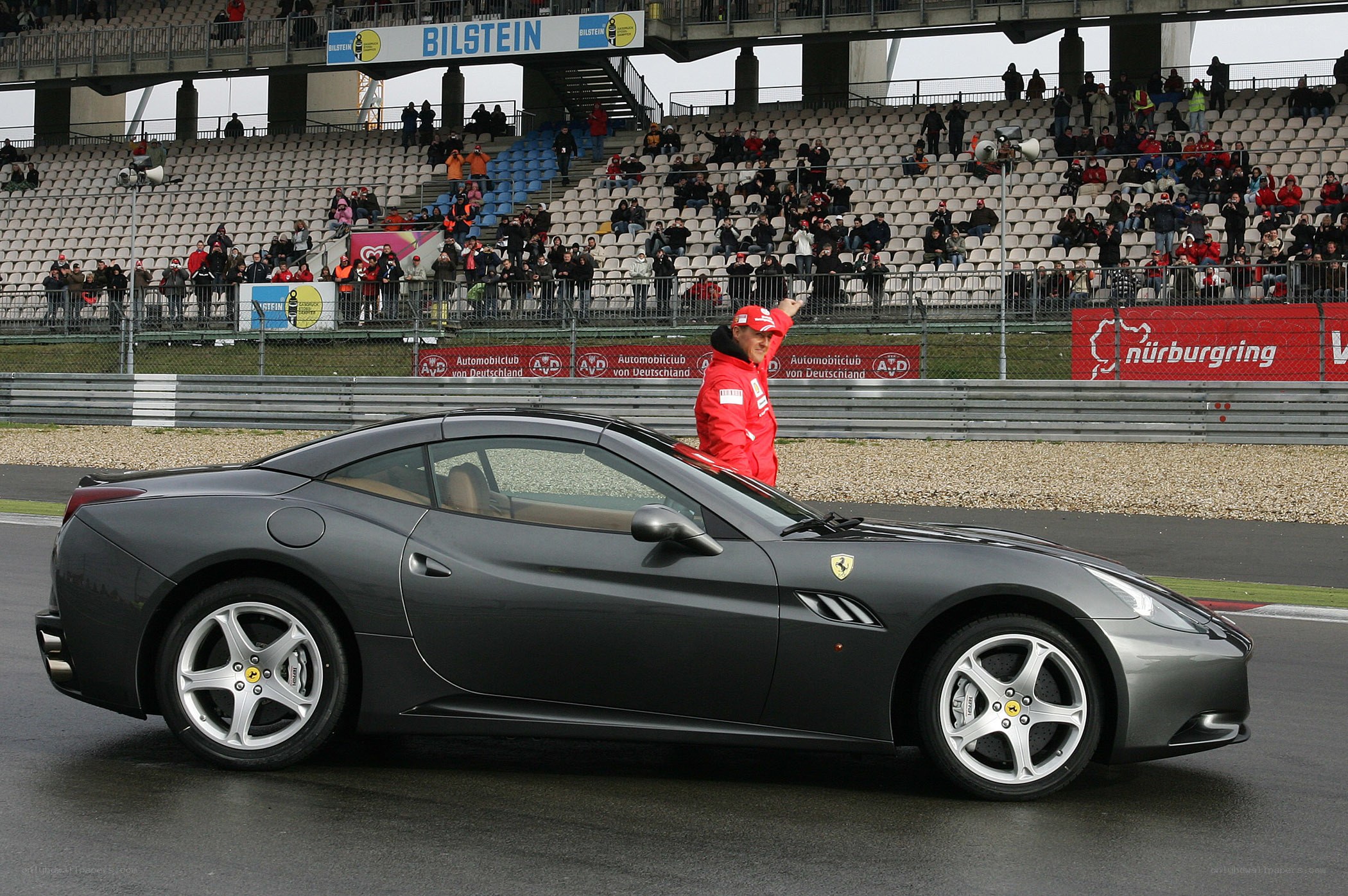 Ferrari driver on racetrack