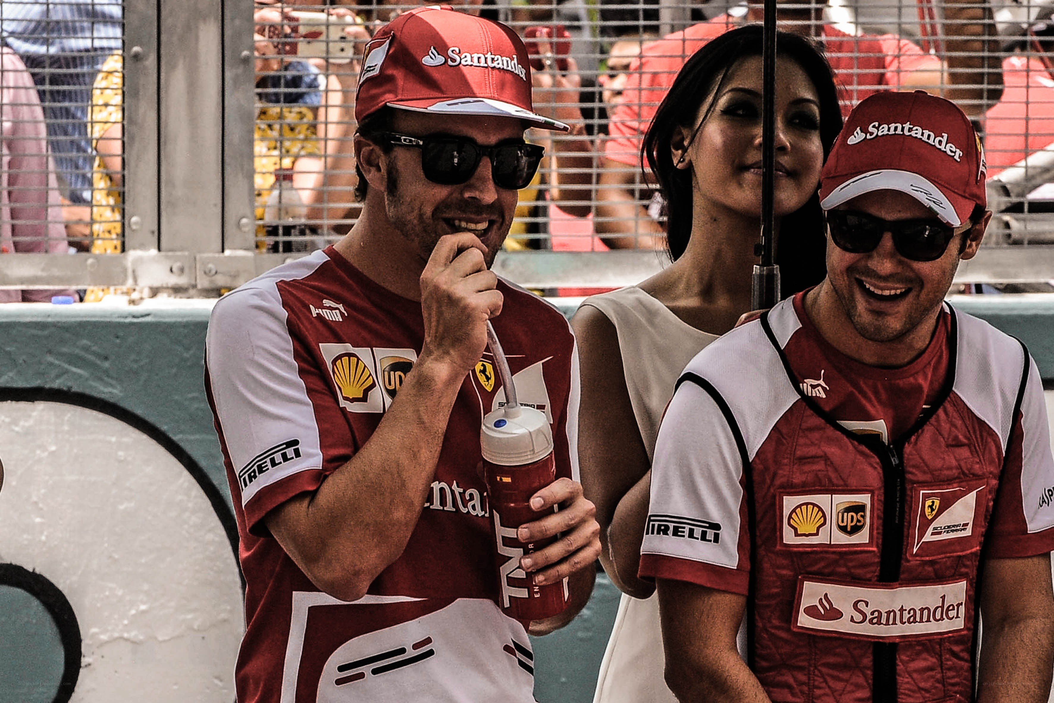 Ferrari drivers with a woman
