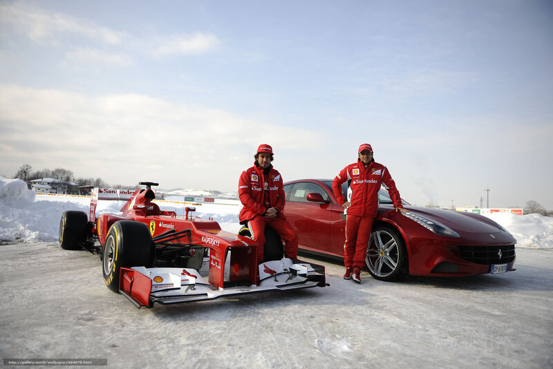 Ferrari drivers with cars in snow