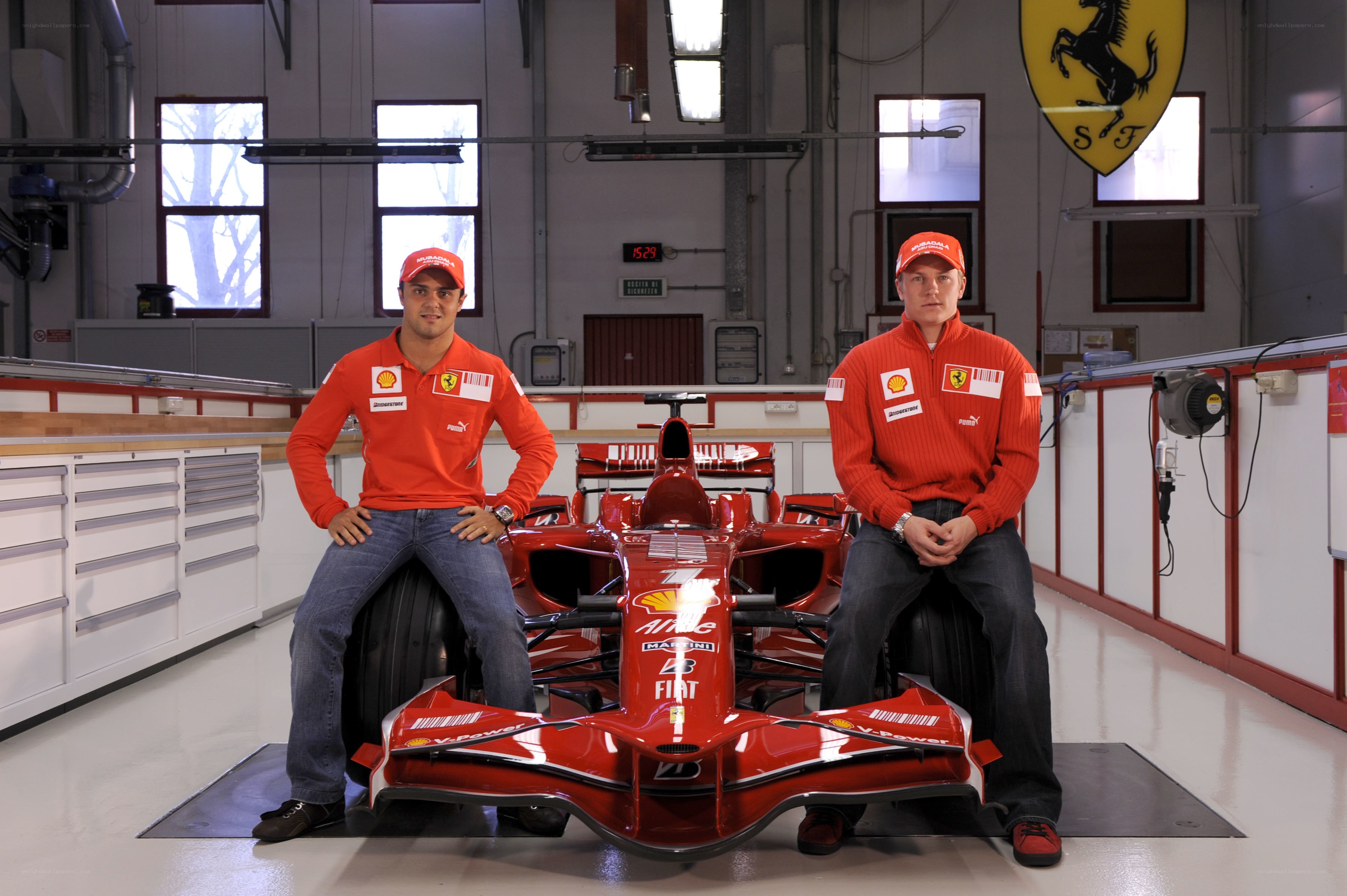 Ferrari drivers with race car