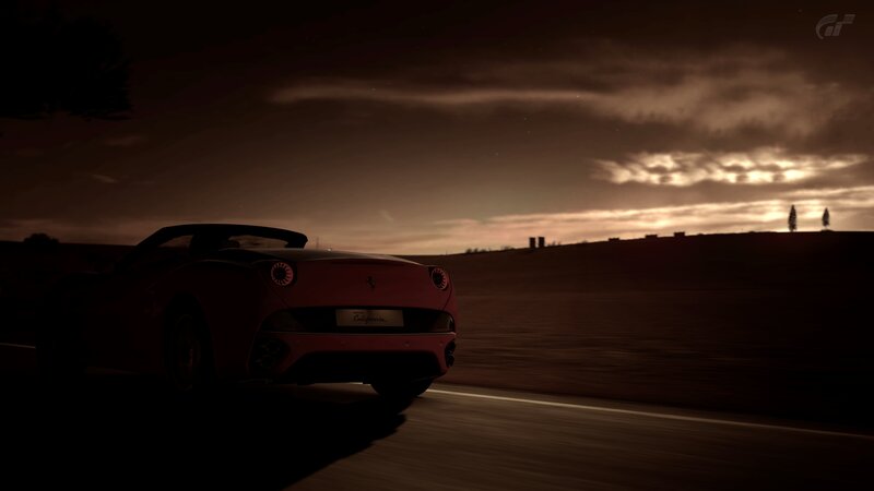 Ferrari driving at dusk