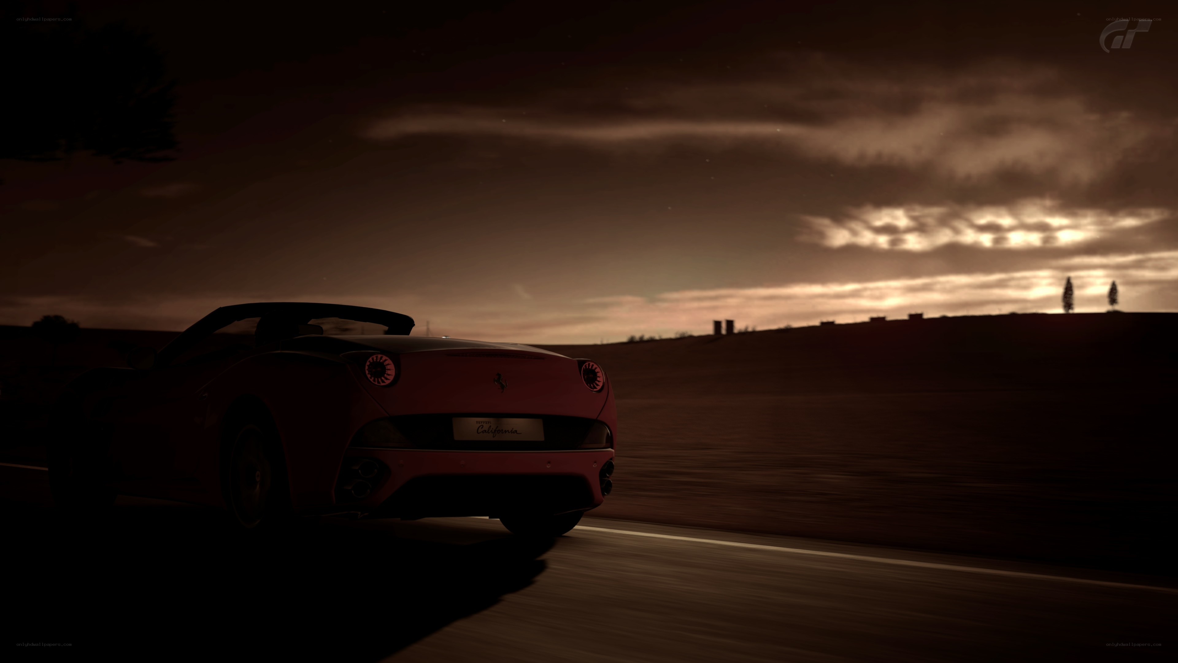 Ferrari driving at dusk