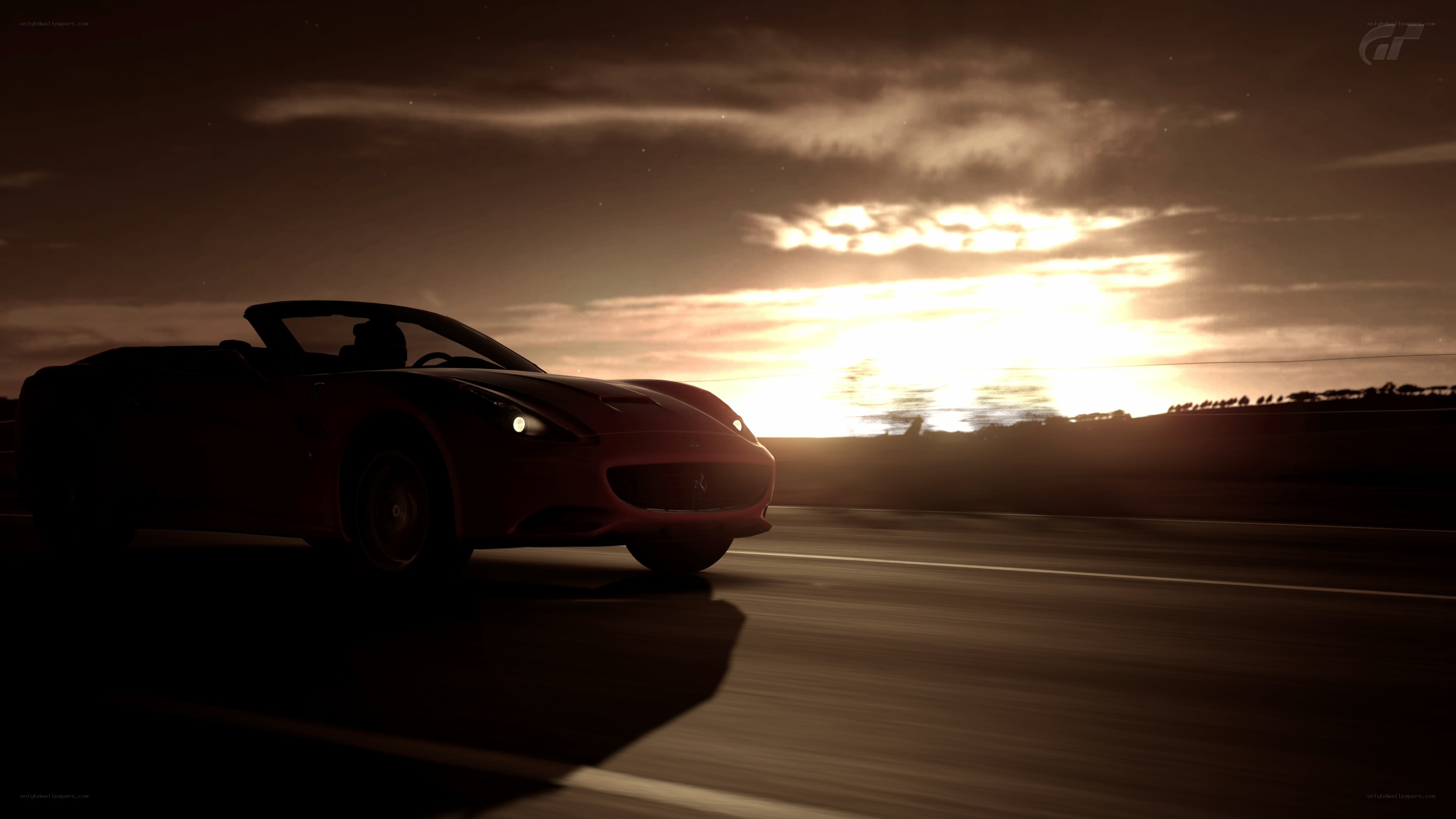 Ferrari driving at sunset