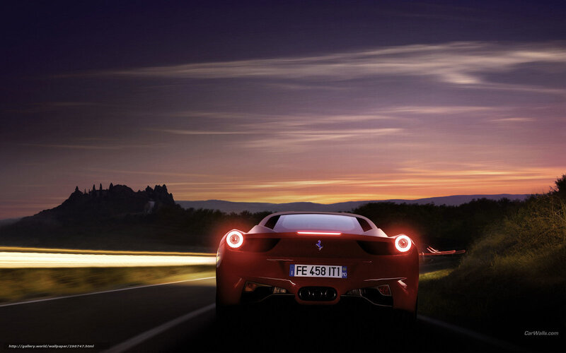 Ferrari driving at sunset