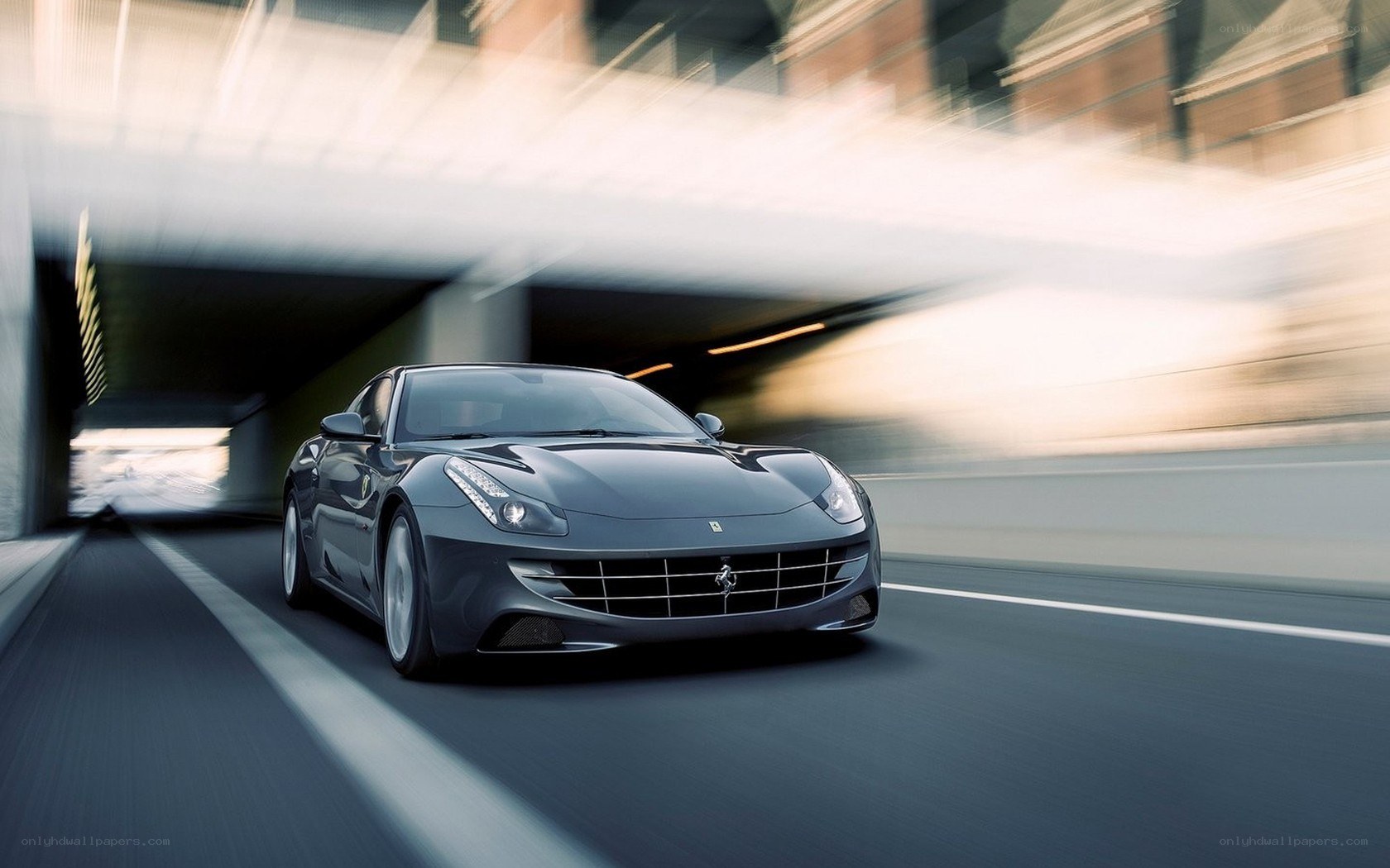 Ferrari driving through tunnel