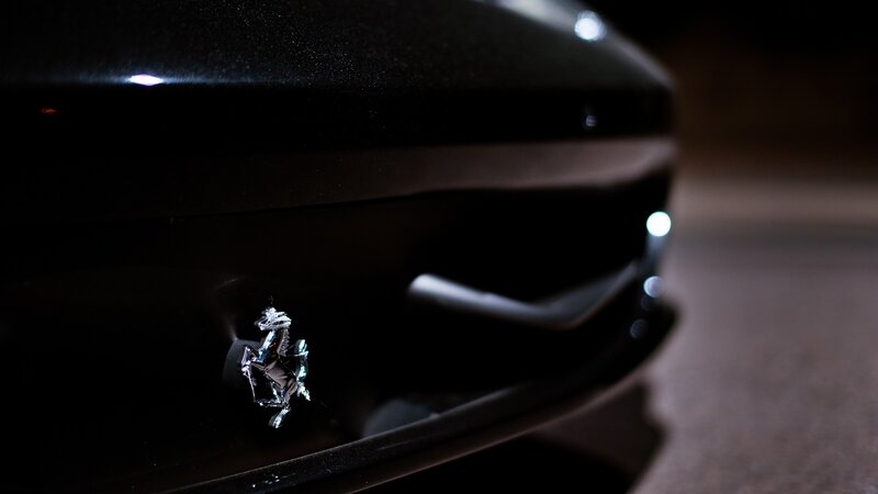 Ferrari Emblem on Car — Black, Dramatic