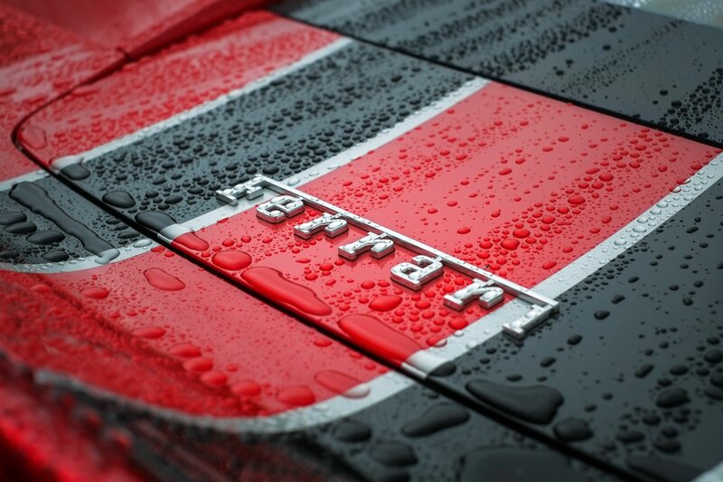 Ferrari Emblem on Car — Red, Dramatic, Photograph, Raindrops