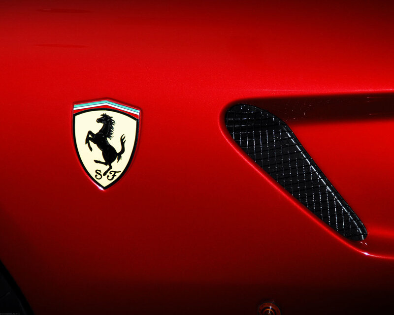 Ferrari Emblem on Car — Red, Dramatic, Photograph