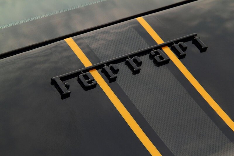 Ferrari emblem on carbon fiber