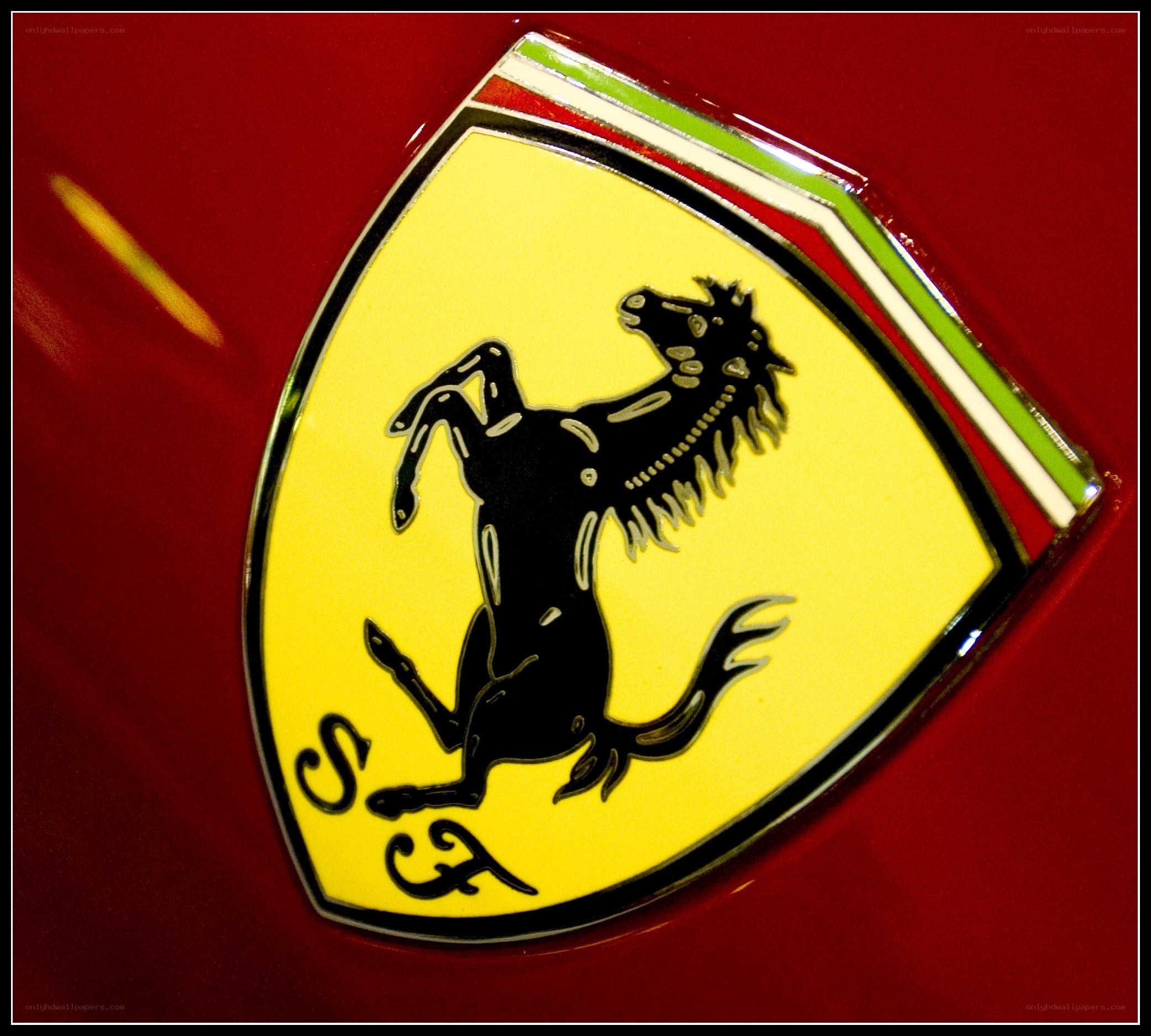 Ferrari emblem on red car