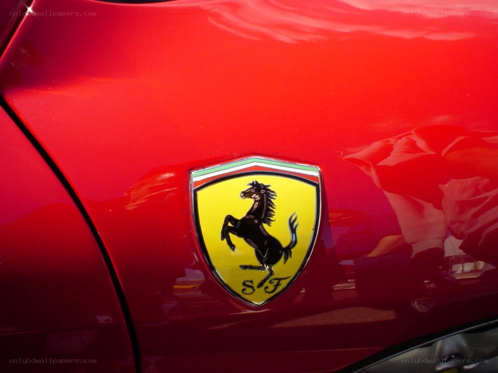 Ferrari emblem on red car