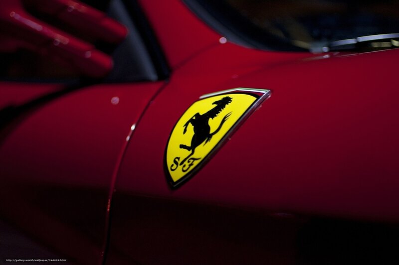 Ferrari emblem on red car