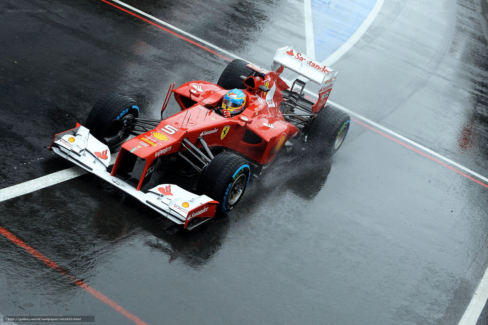 Ferrari F1 car on wet track