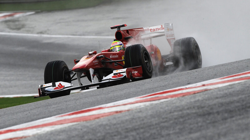 Ferrari F1 car on wet track