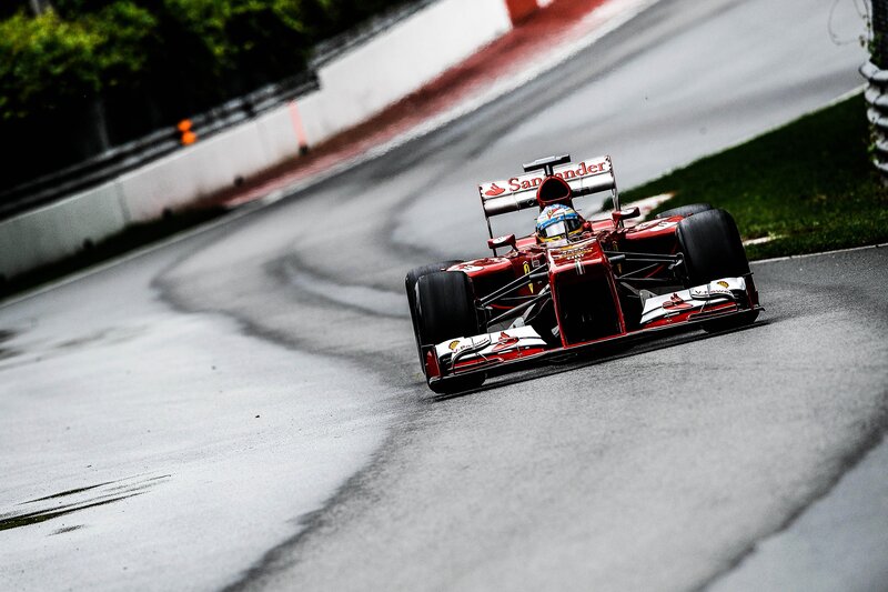 Ferrari F1 car on wet track