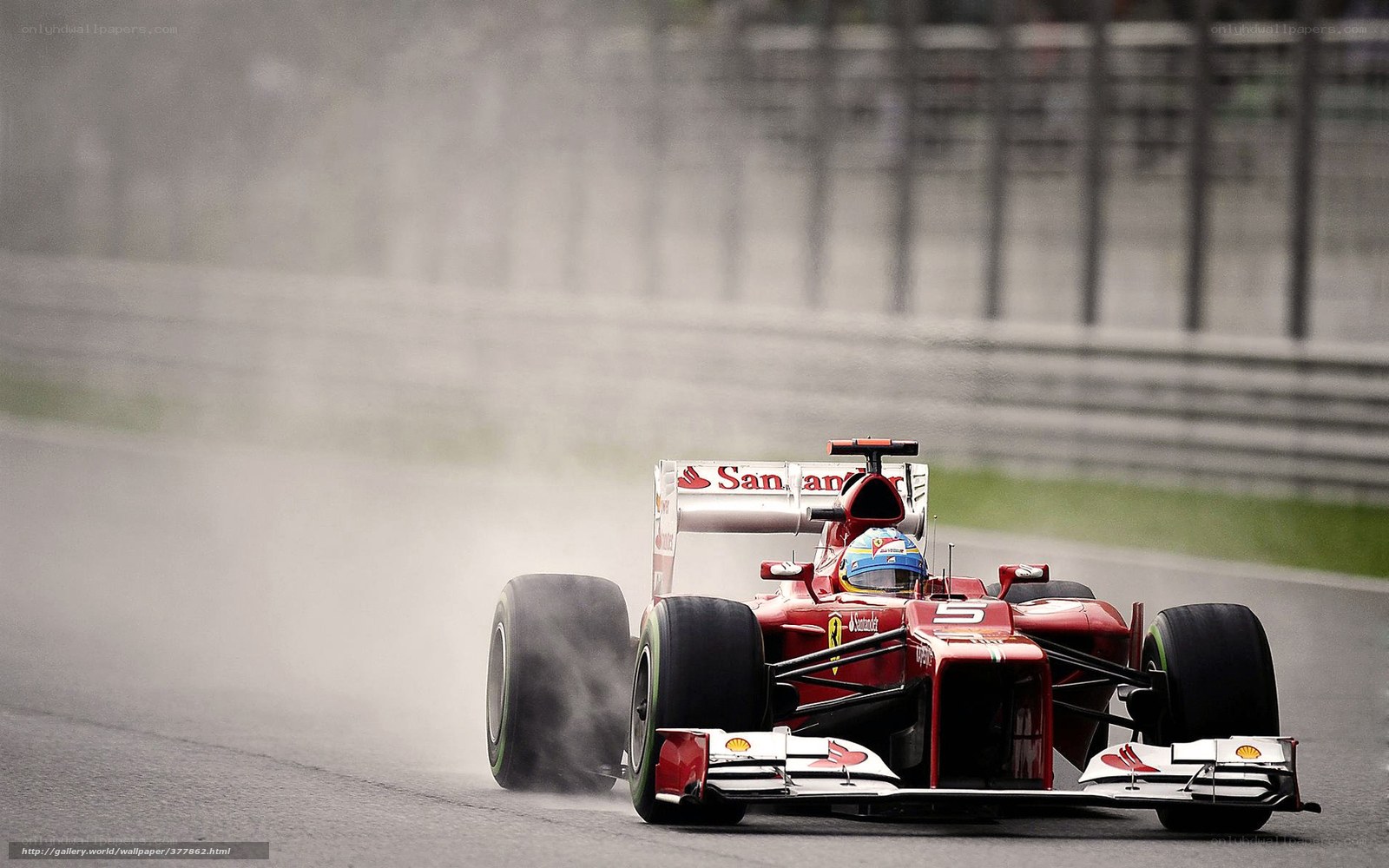 Ferrari F1 car on wet track