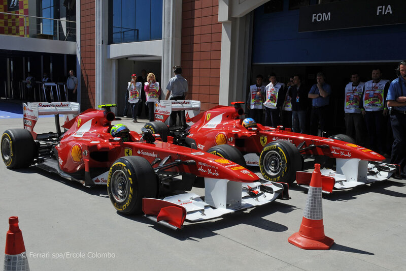 Ferrari F1 cars on track