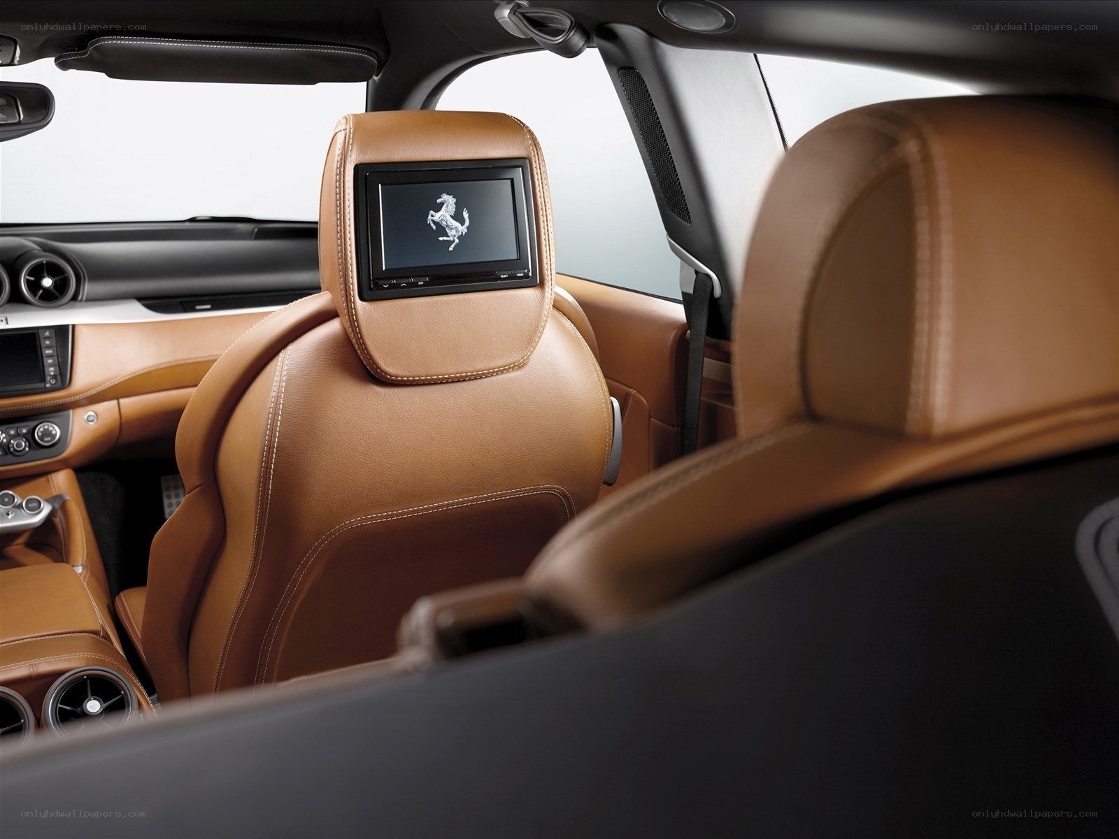 Ferrari interior with headrest screens