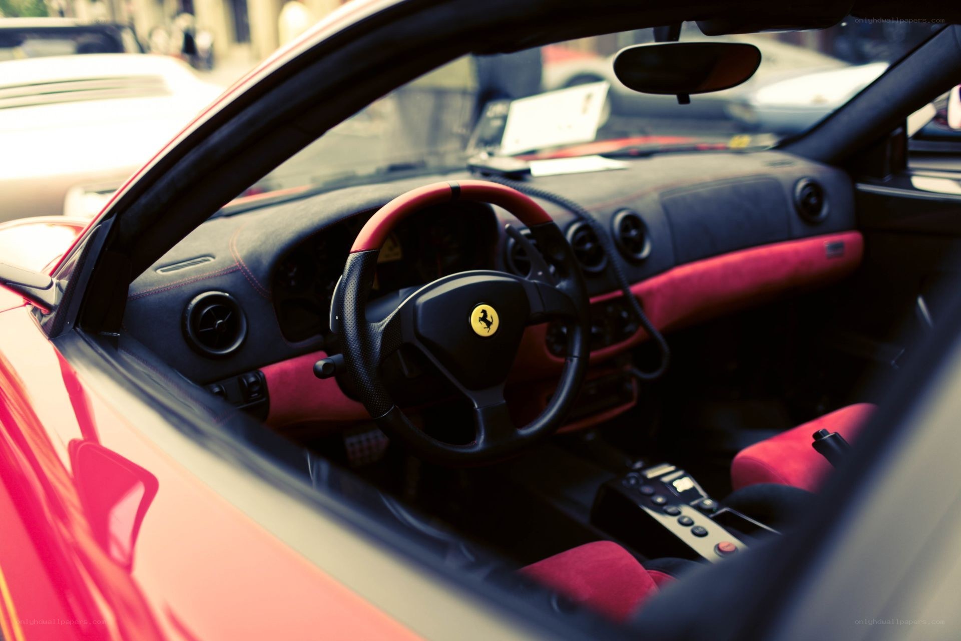 Ferrari interior with red accents