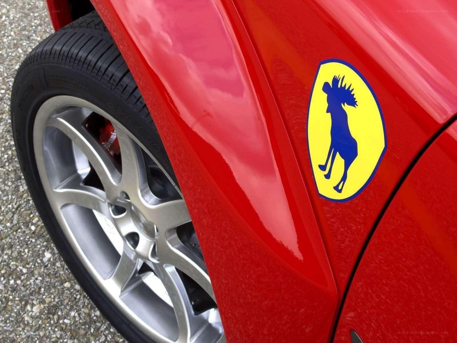Ferrari logo on red car