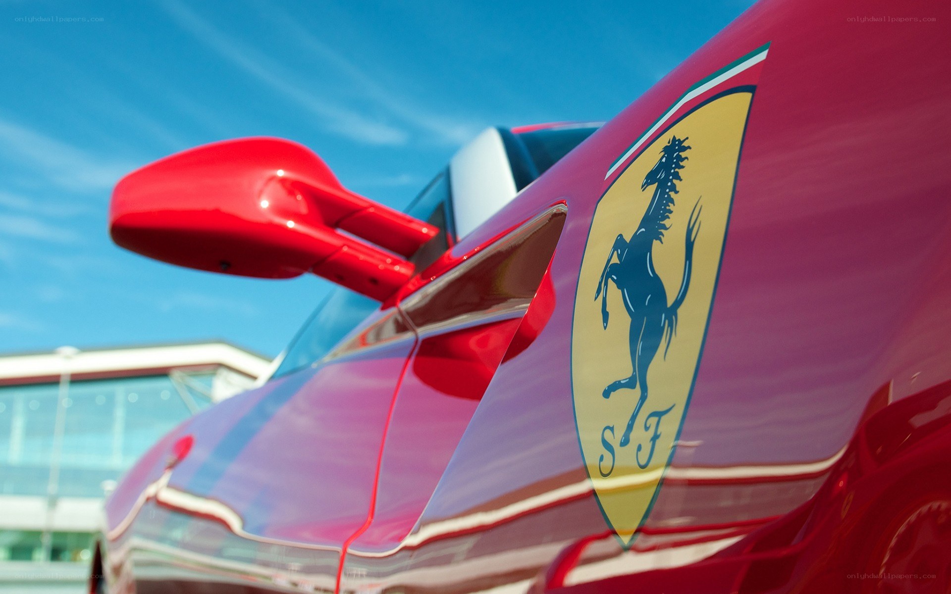 Ferrari logo on red car