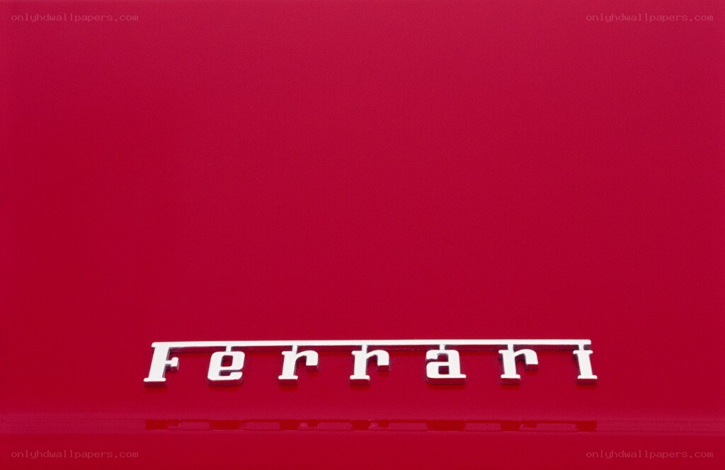 Ferrari logo on red surface