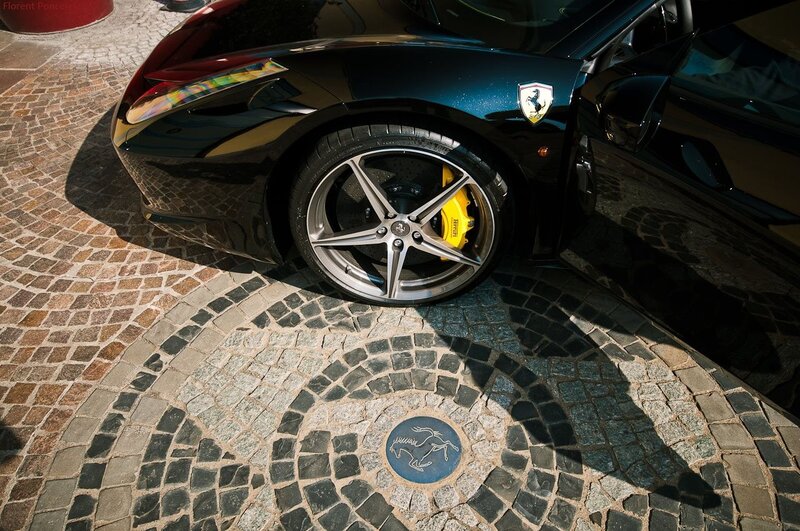 Ferrari on cobblestone pavement