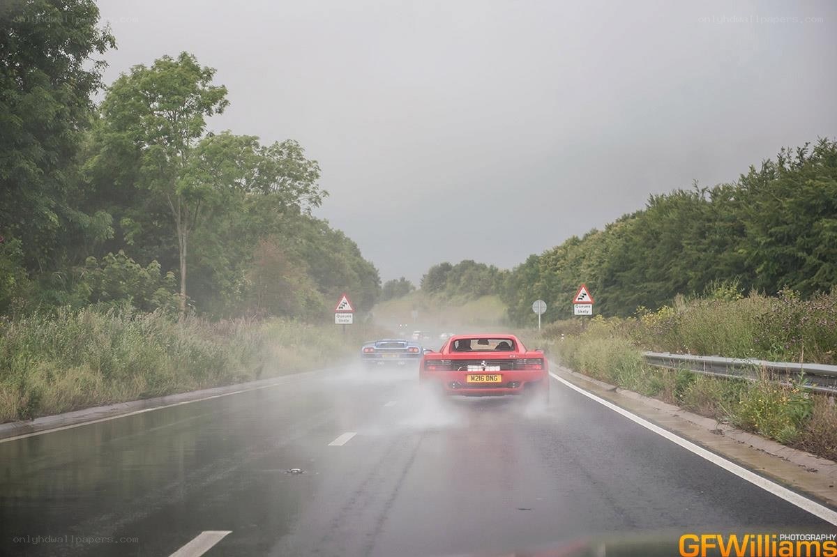 Ferrari on wet road