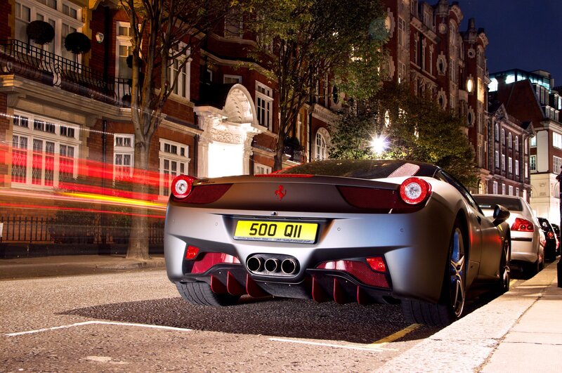 Ferrari parked on a city street