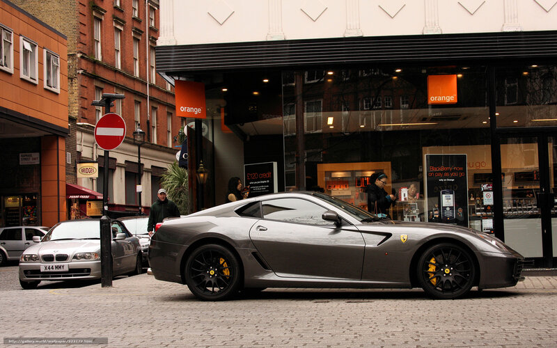Ferrari parked on a city street