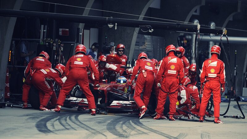 Ferrari pit crew in action