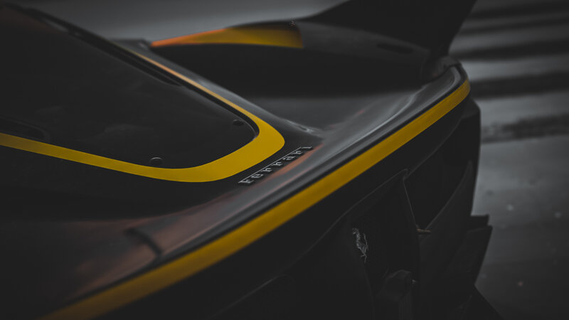 Ferrari Race Car — Black, Dramatic, Photograph