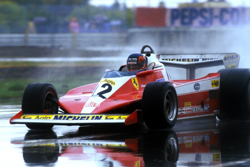 Ferrari race car on wet track
