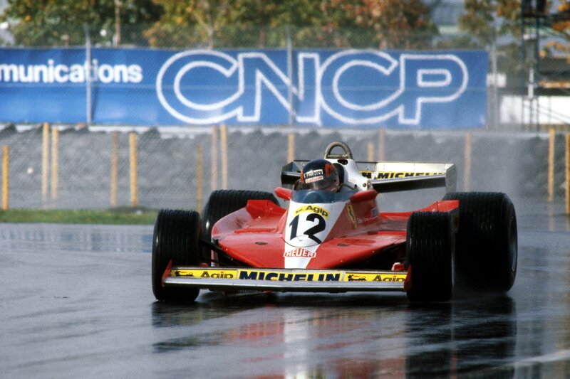 Ferrari race car on wet track