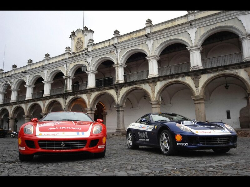 Ferrari race cars in courtyard