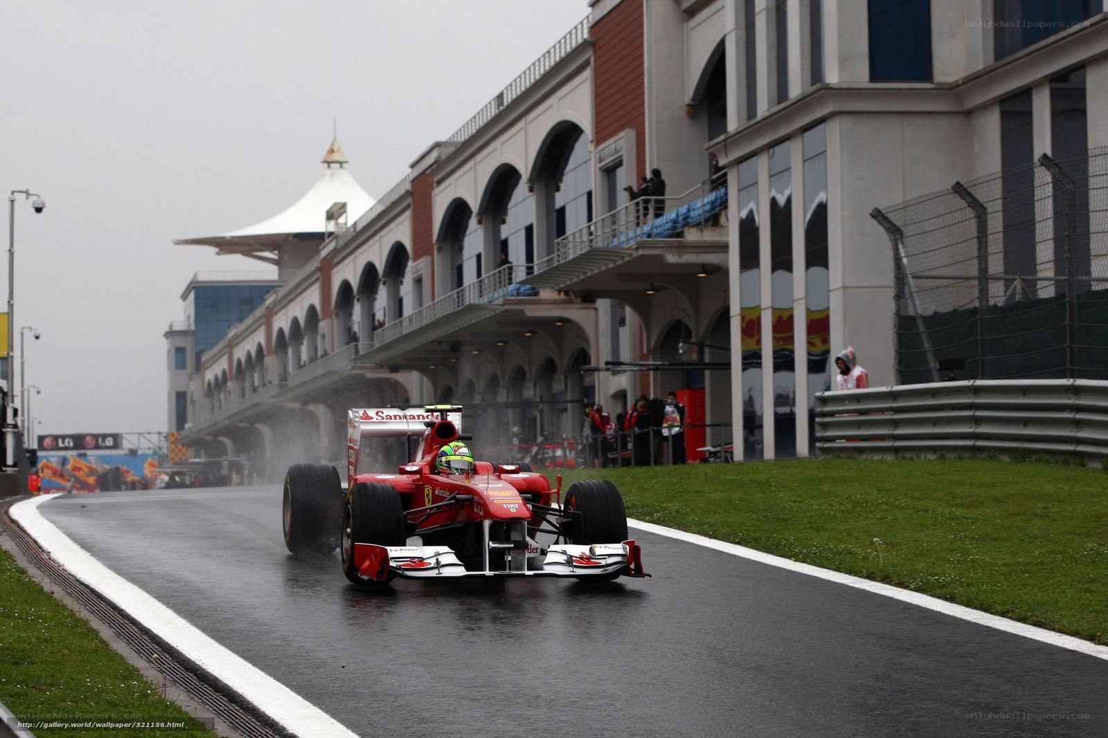 Ferrari racing on wet track