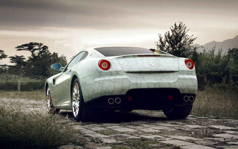 Ferrari sports car on cobblestones