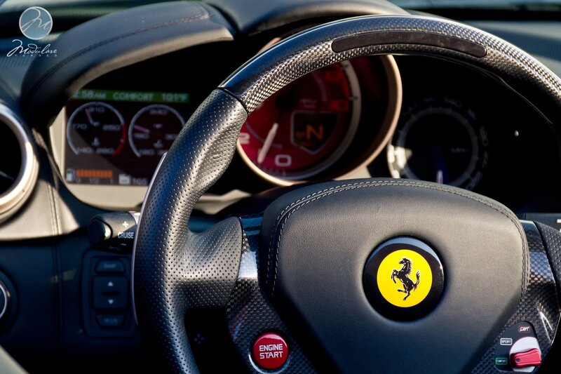 Ferrari Steering Wheel — Black, Dramatic, Morning