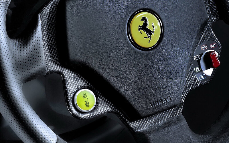 Ferrari Steering Wheel — Black, Dramatic, Photograph, Airbag