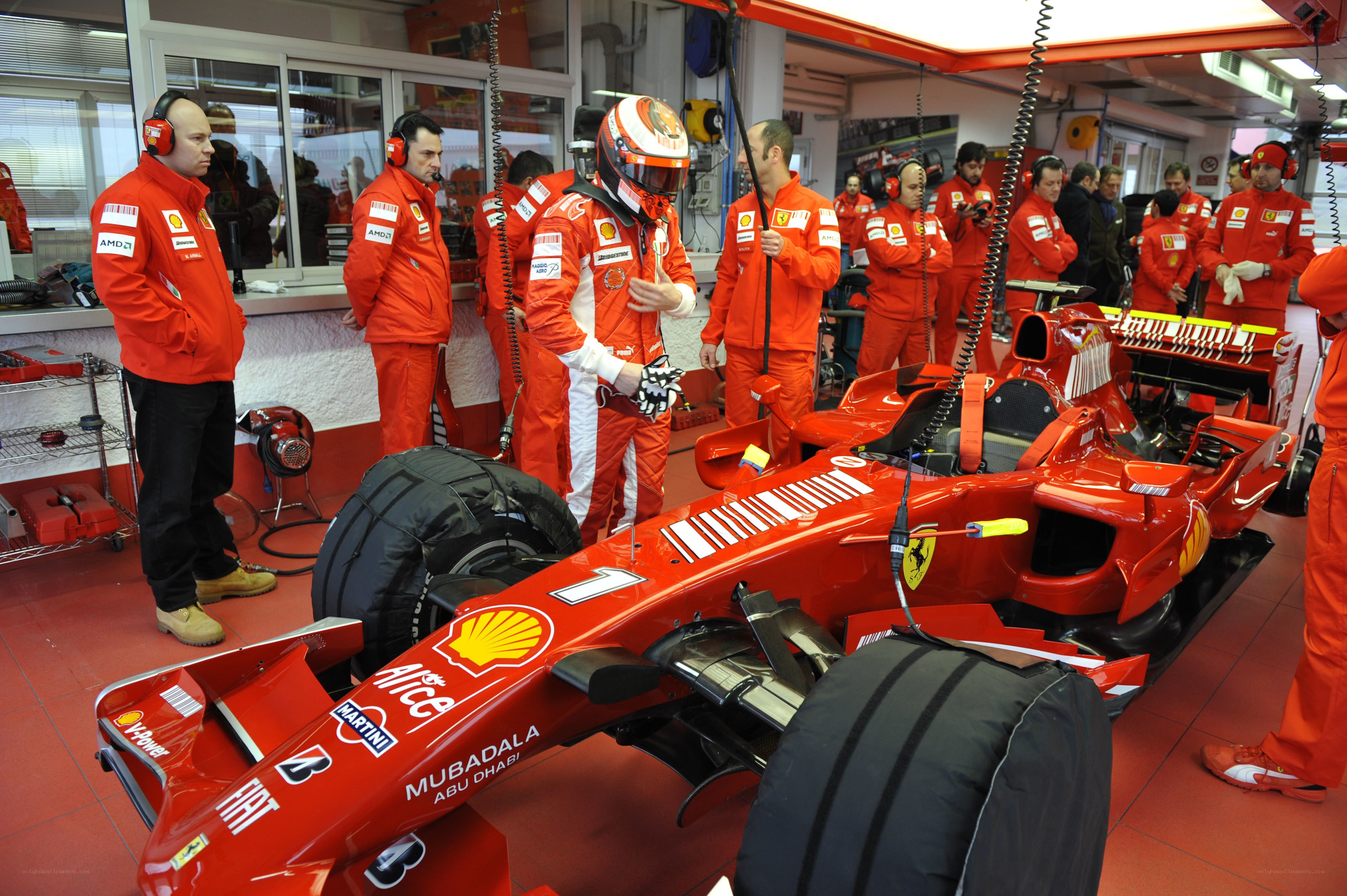 Ferrari team in the pit lane