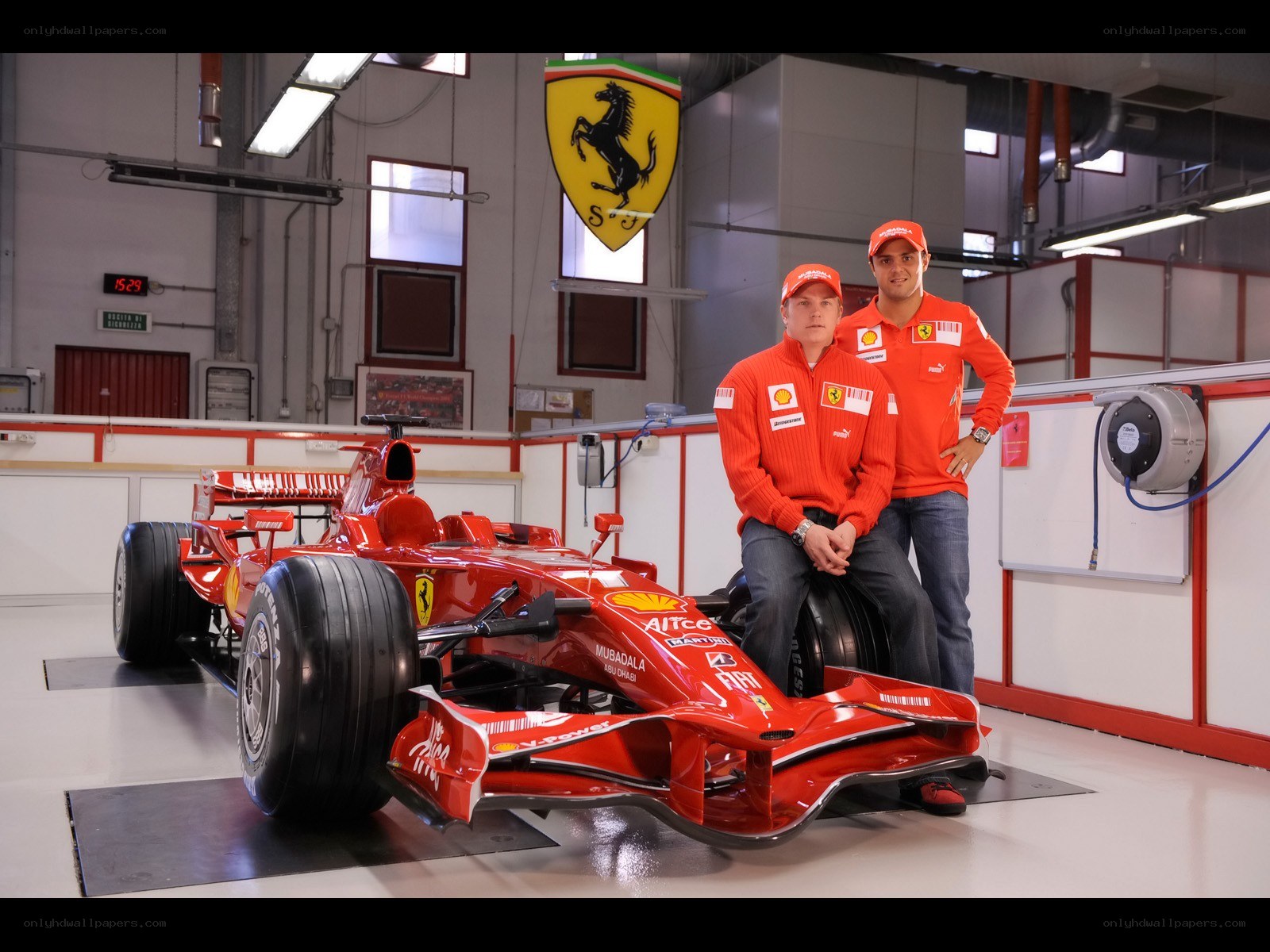 Ferrari team with race car