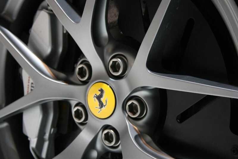 Ferrari wheel with prancing horse logo