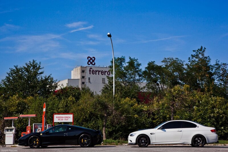Ferrero factory with two sports cars