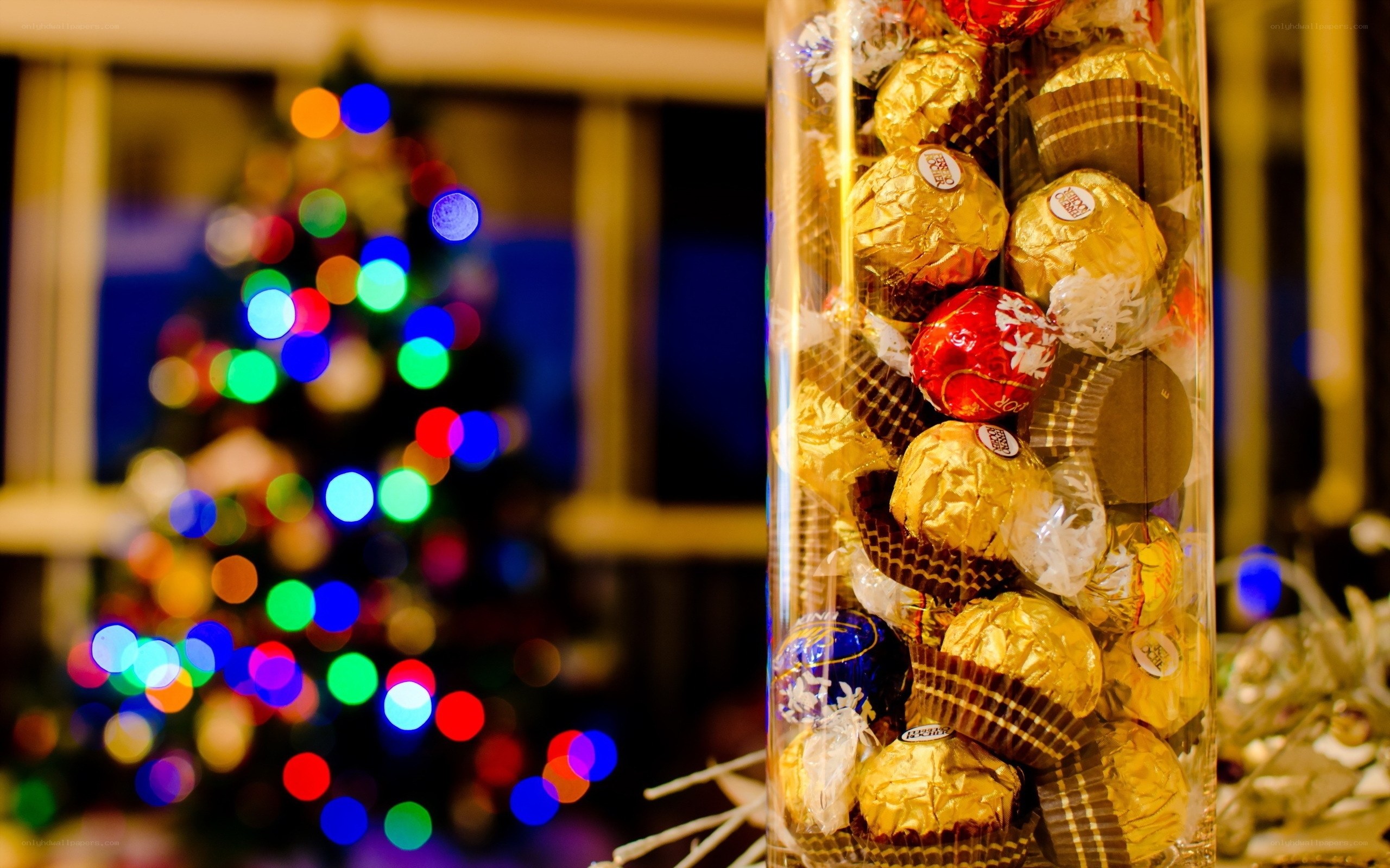 Ferrero Rocher near Christmas tree